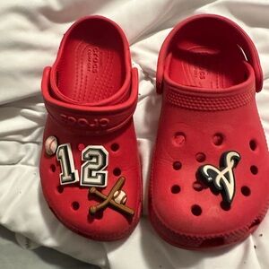 CROCS Kids Red Sandals with Sports Charms